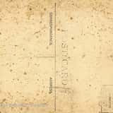 Blank back of an antique yellowed postcard texture, showing the correspondence and address sections with light age stains and vintage typography.