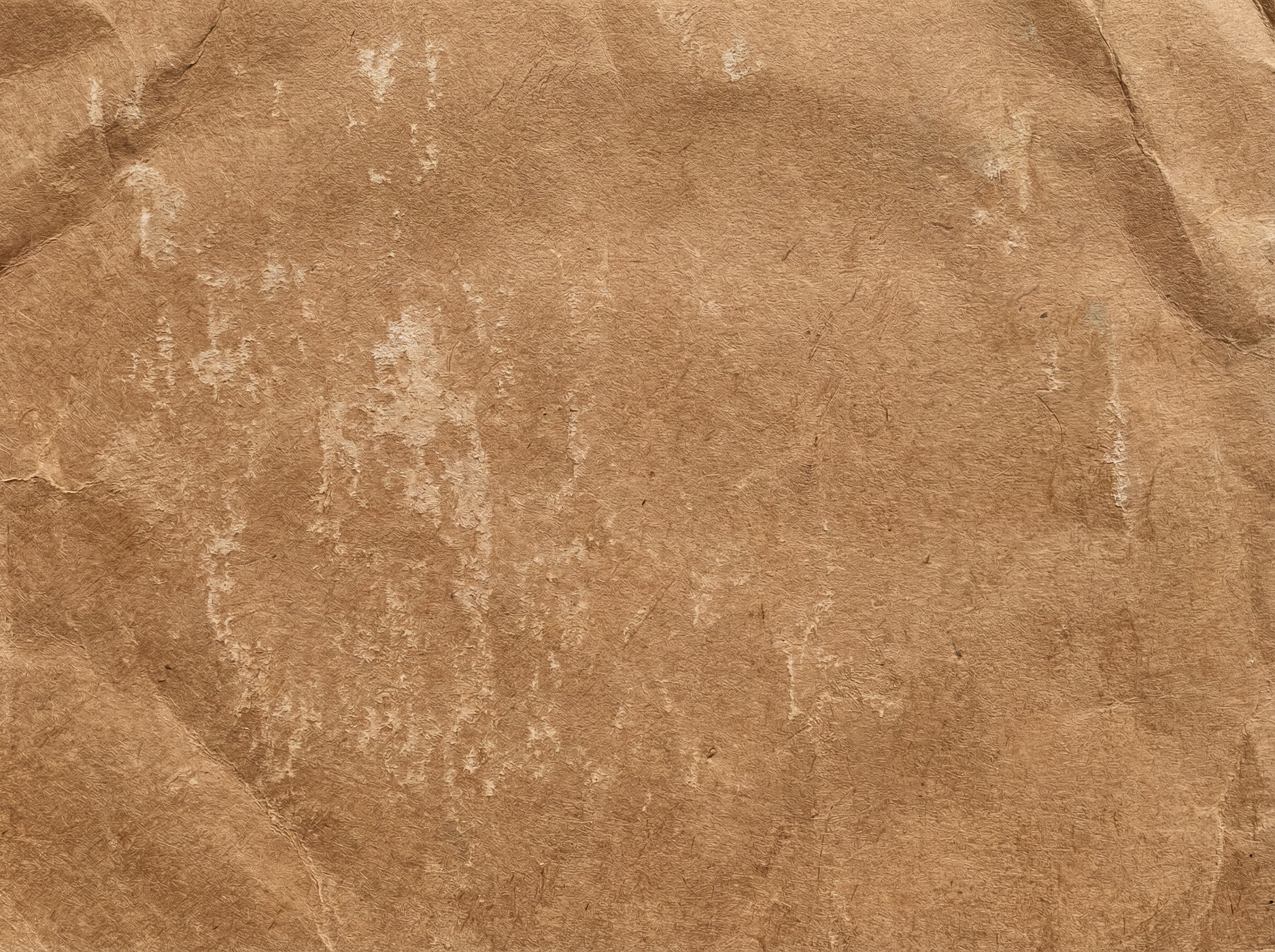 A detailed close-up texture of crumpled light brown kraft paper with visible fibers and white distressed marks.