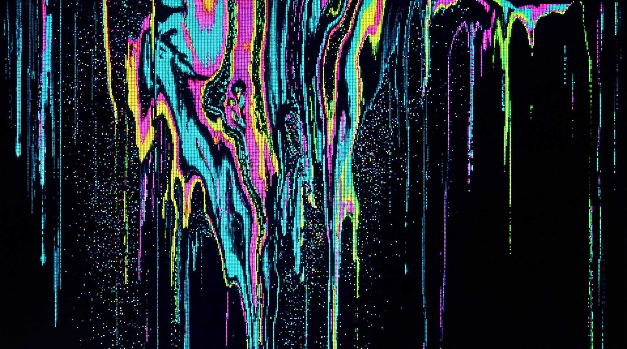 A digital texture featuring vibrant, neon-colored liquid glitch effects dripping downwards against a black background.