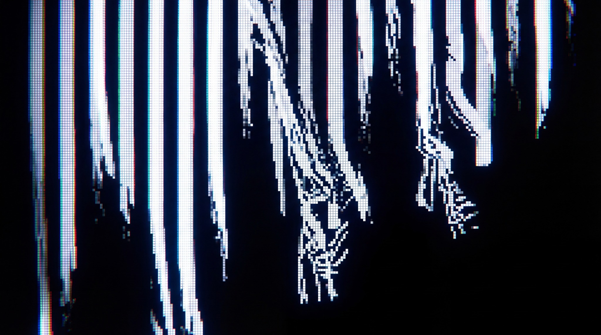 Abstract black and white digital glitch texture with vertical white and gray lines that are distorted and fractured, resembling analog video signal degradation.