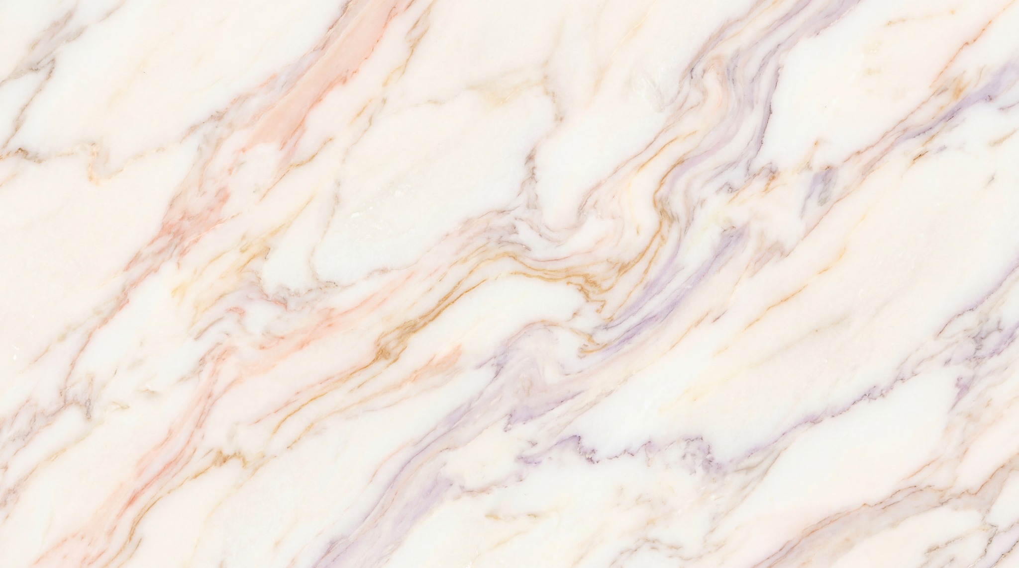 A seamless 4K texture of cream-colored marble with flowing veins of soft pink, pale gold, and muted purple.