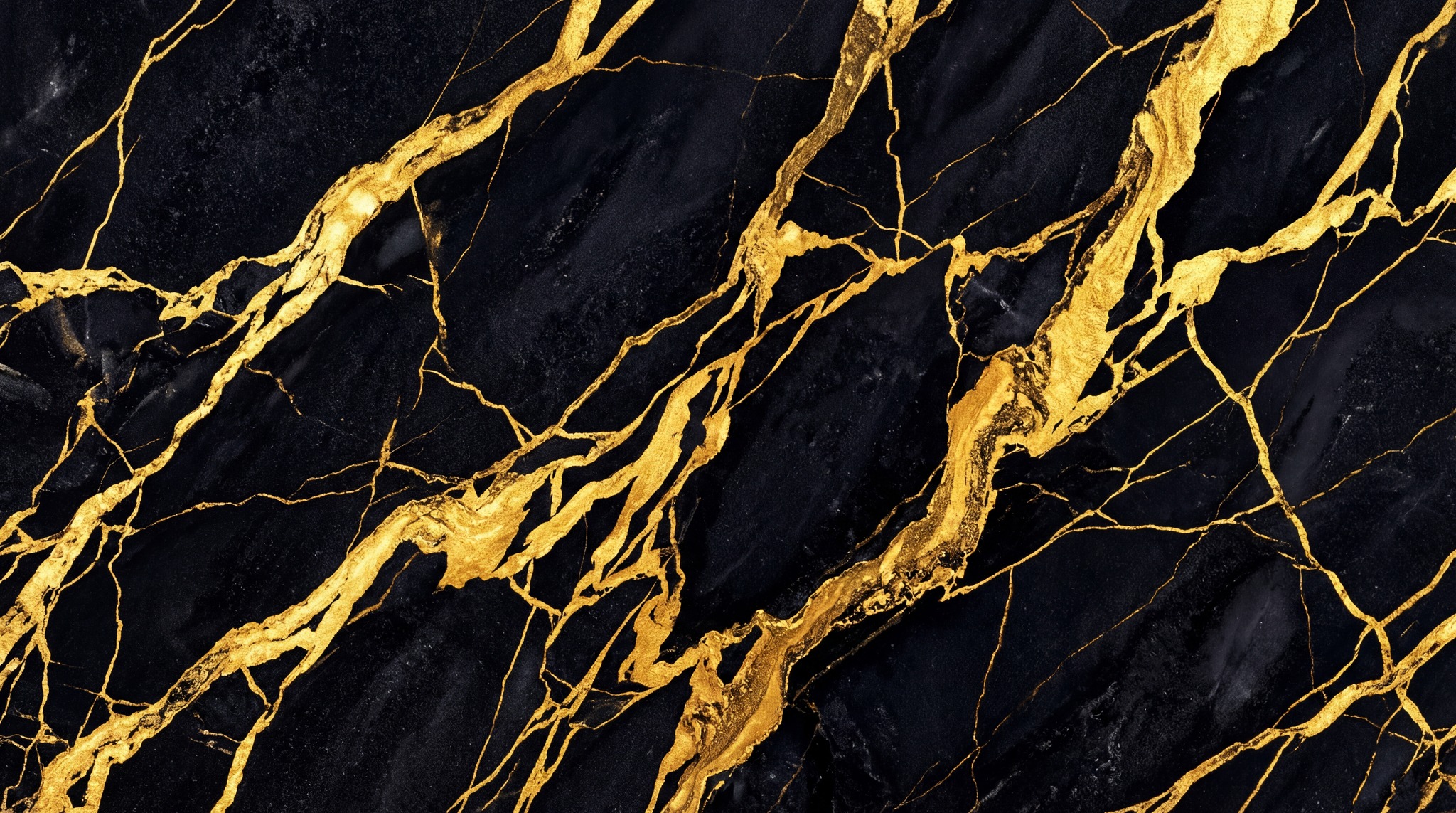 A high-resolution texture of black marble with prominent, irregular gold veins.