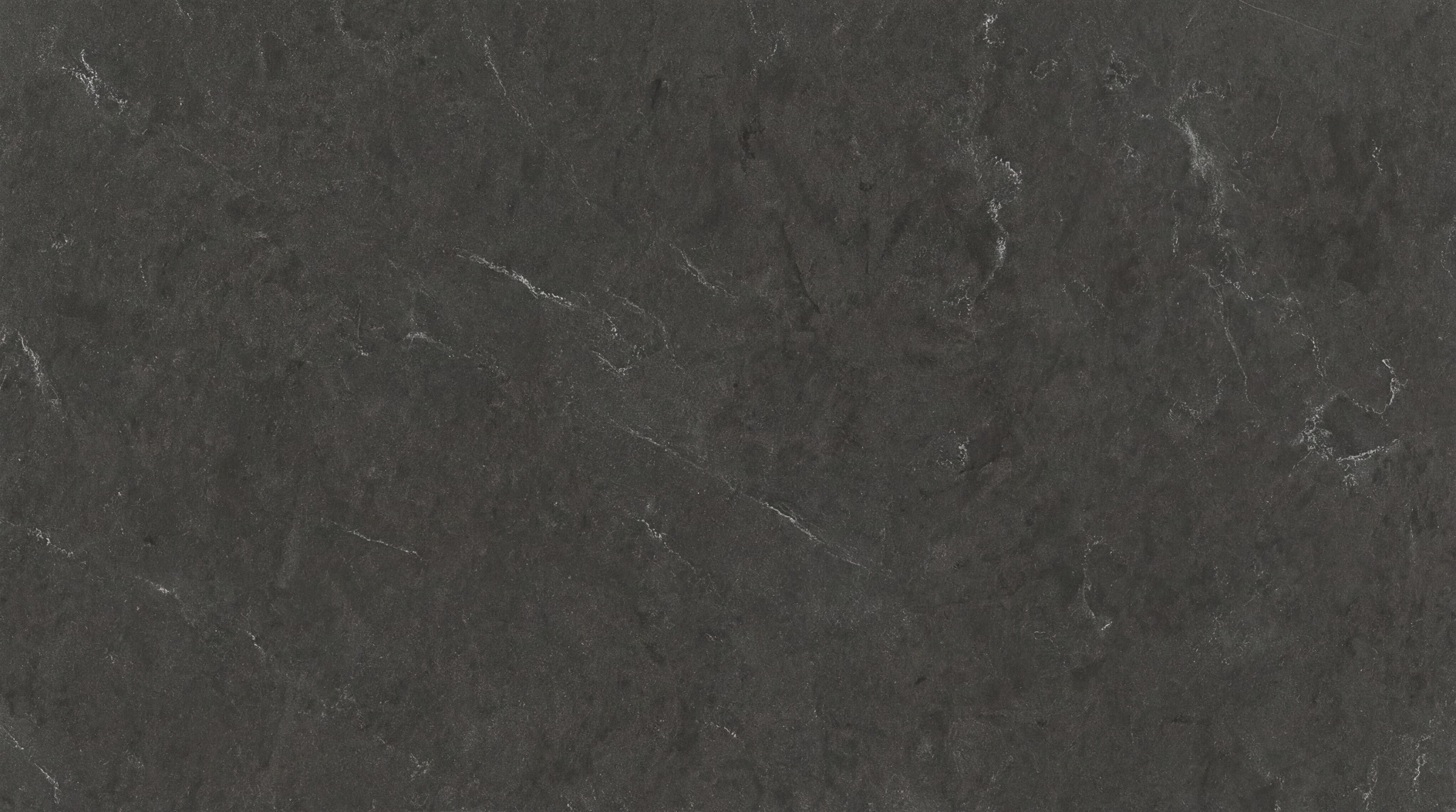 Seamless 4K texture of charcoal grey marble with fine white swirling veins.